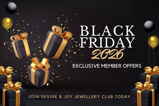 Black Friday 2026 promotional banner featuring black gift boxes, gold ribbons, balloons, and confetti on a dark background, highlighting exclusive member offers for Desire & Joy Jewellery.