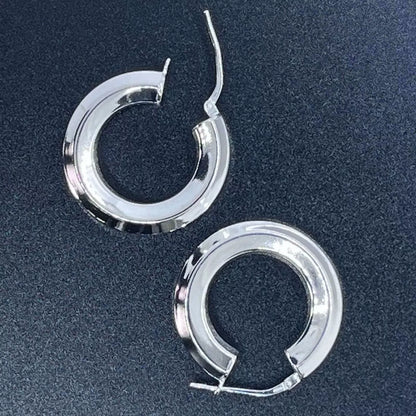Chunky Sterling Silver 925 Hoop Earrings tube-shape Hexagon placed on a black background.