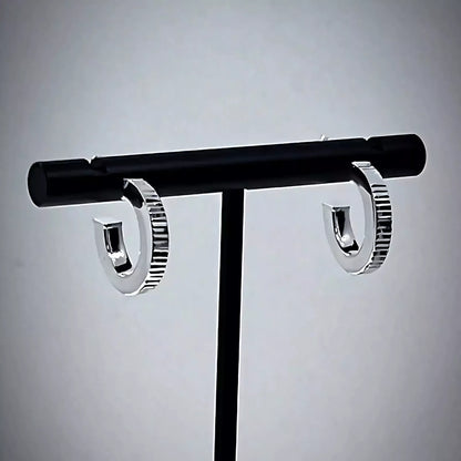 Lobe Hoop earrings crafted in Sterling Silver 925 on black t-bar stand.