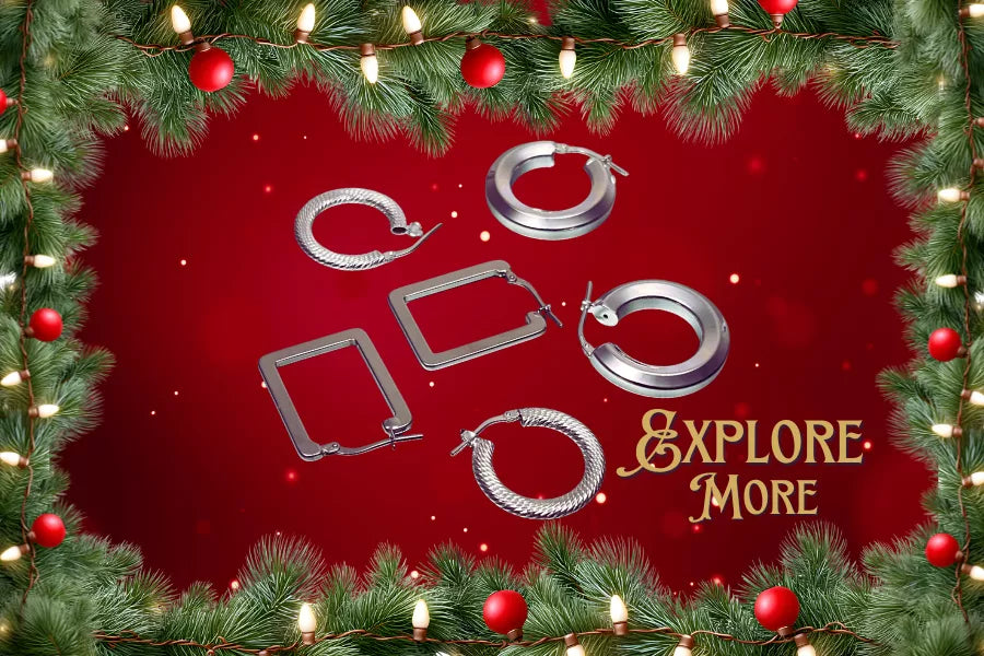 Silver hoop earrings on a red background with Christmas decorations